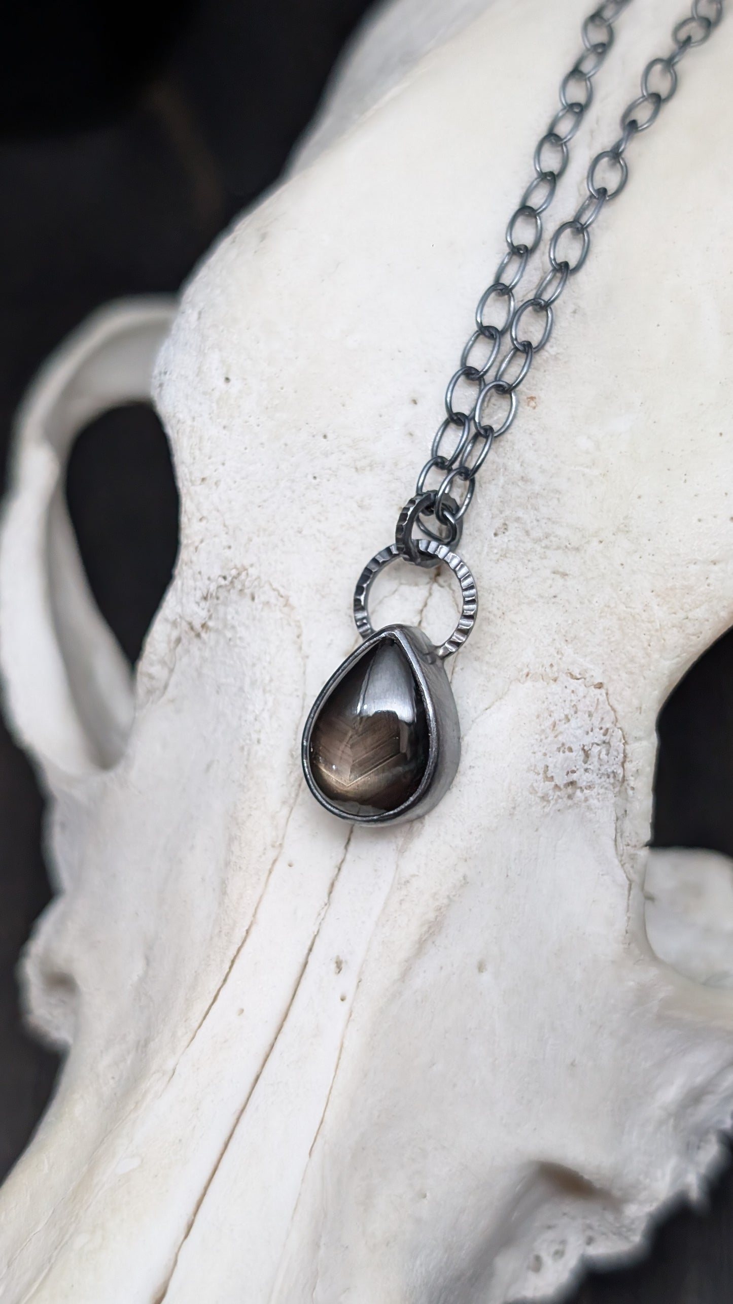 Black Star Sapphire Teardrop Textured Sterling Silver Necklace