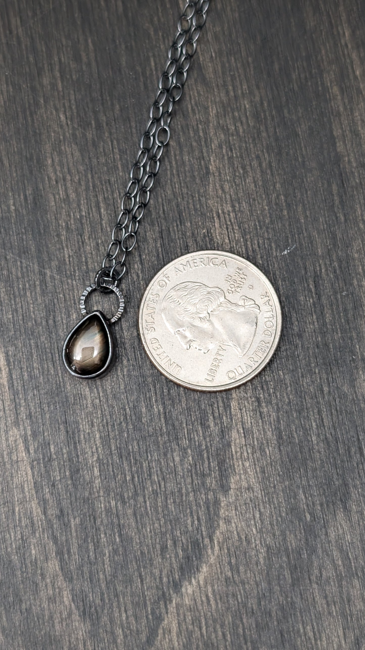 Black Star Sapphire Teardrop Textured Sterling Silver Necklace