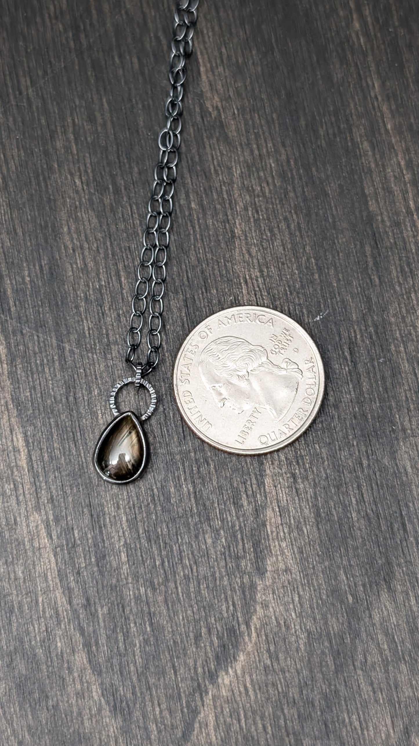 Black Star Sapphire Teardrop Textured Sterling Silver Necklace