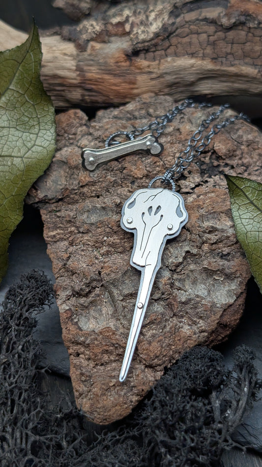 Narwhal Sterling Silver Riveted Skull Necklace