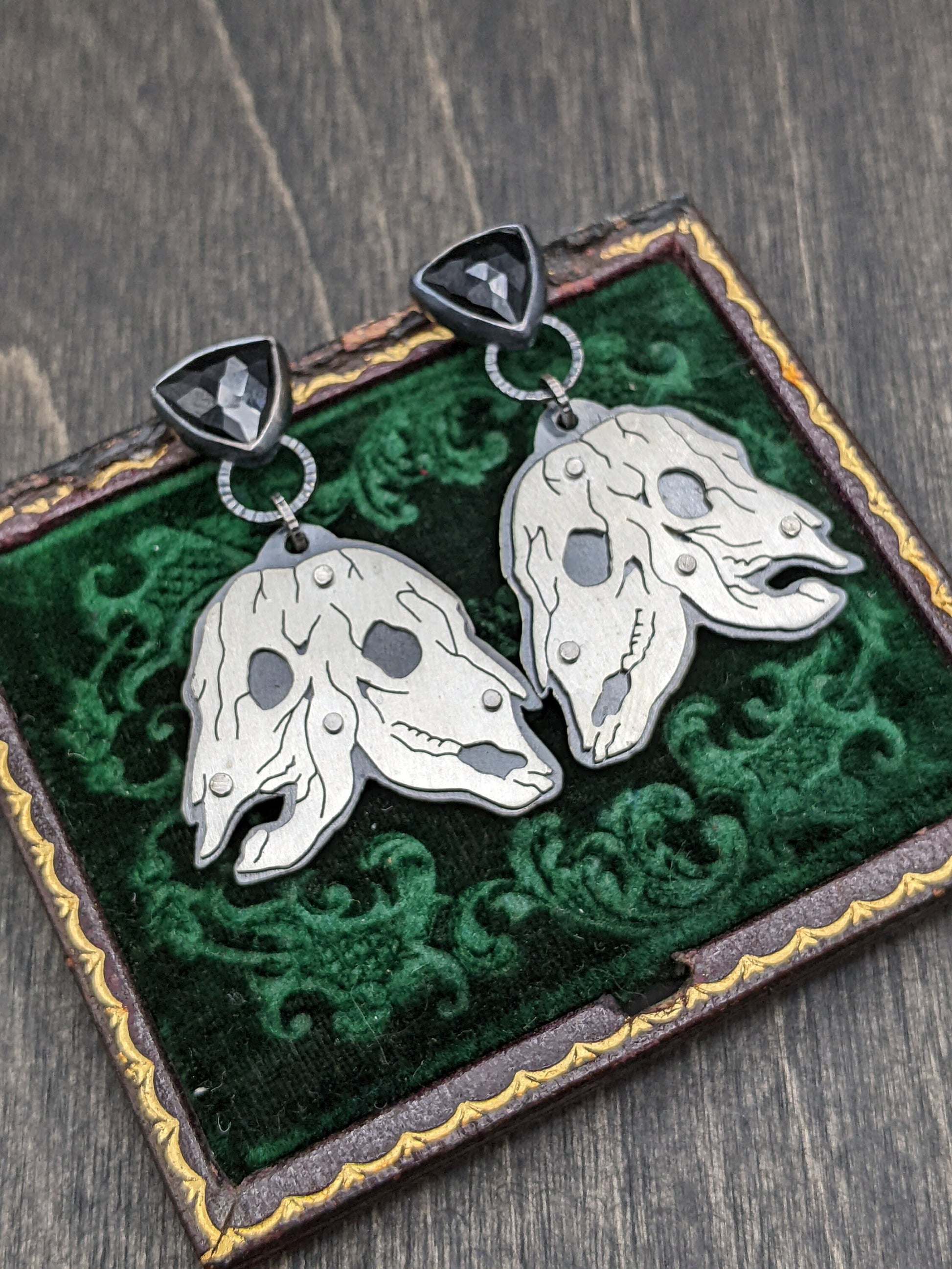 Riveted Conjoined Cow Skull with Black Spinel Dangle Drop Stud Earrings