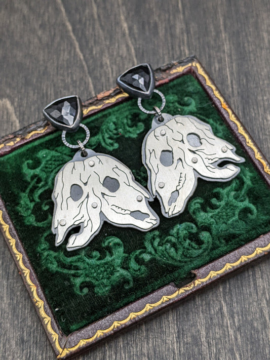 Riveted Conjoined Cow Skull with Black Spinel Dangle Drop Stud Earrings