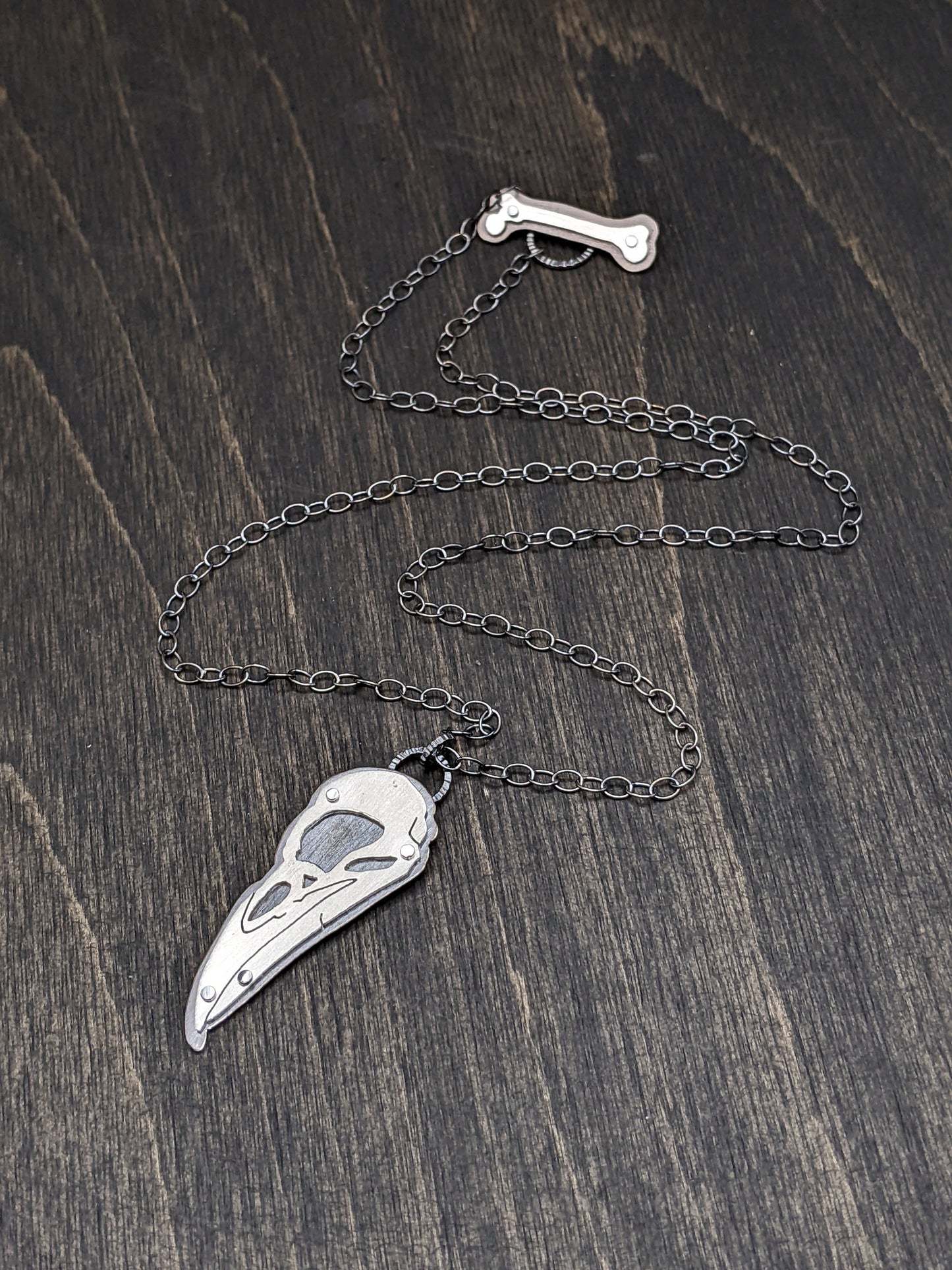 Sterling Silver Riveted Raven Bird Skull Necklace